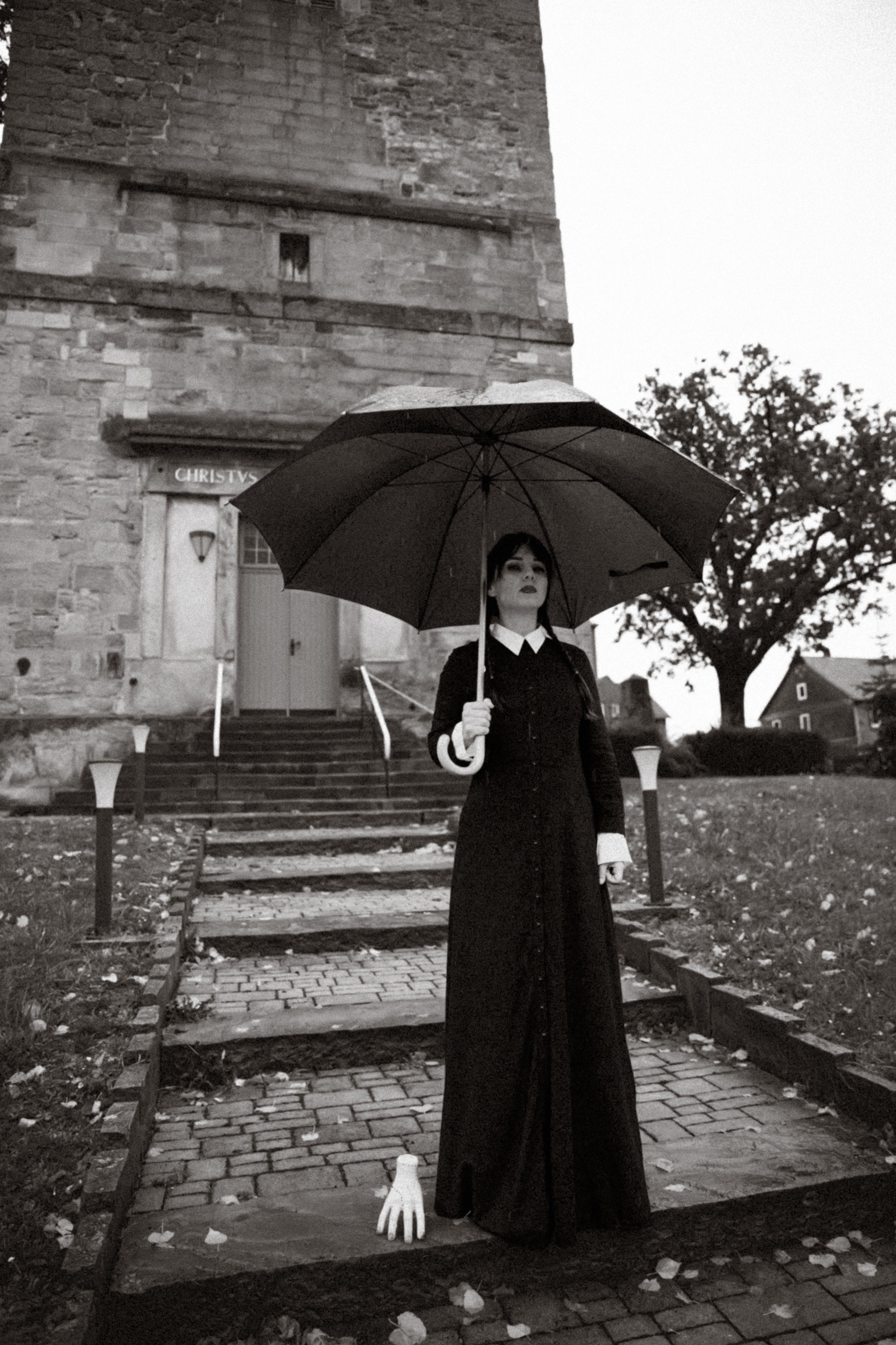 Woman in Wednesday Addams Costume in Black and White  Free Stock Photo