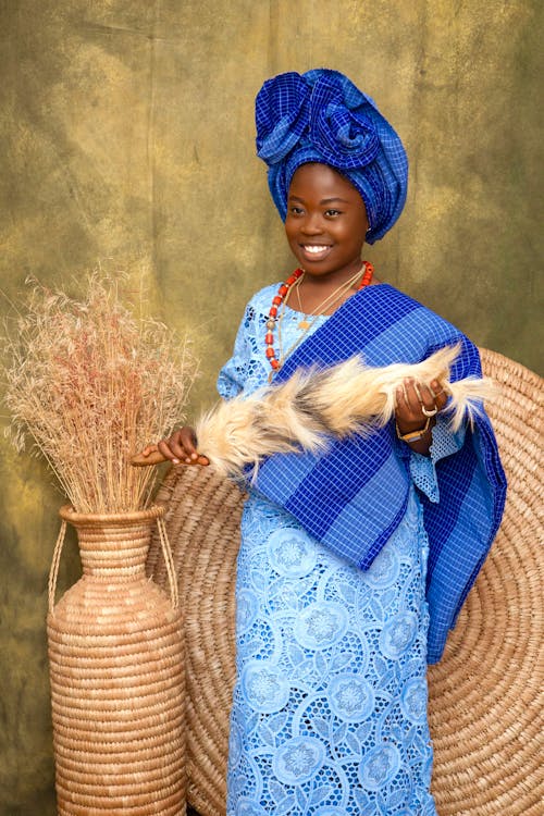 A Woman in a Traditional African Clothing