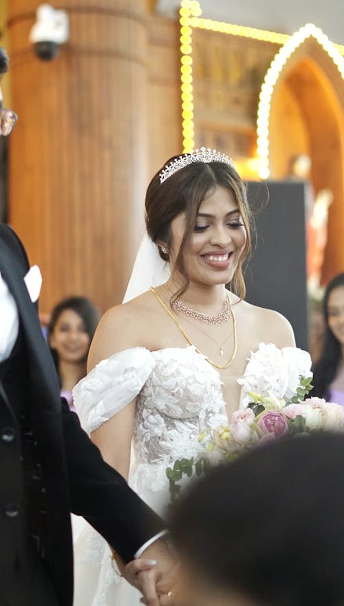 A Smiling Bride During the Wedding