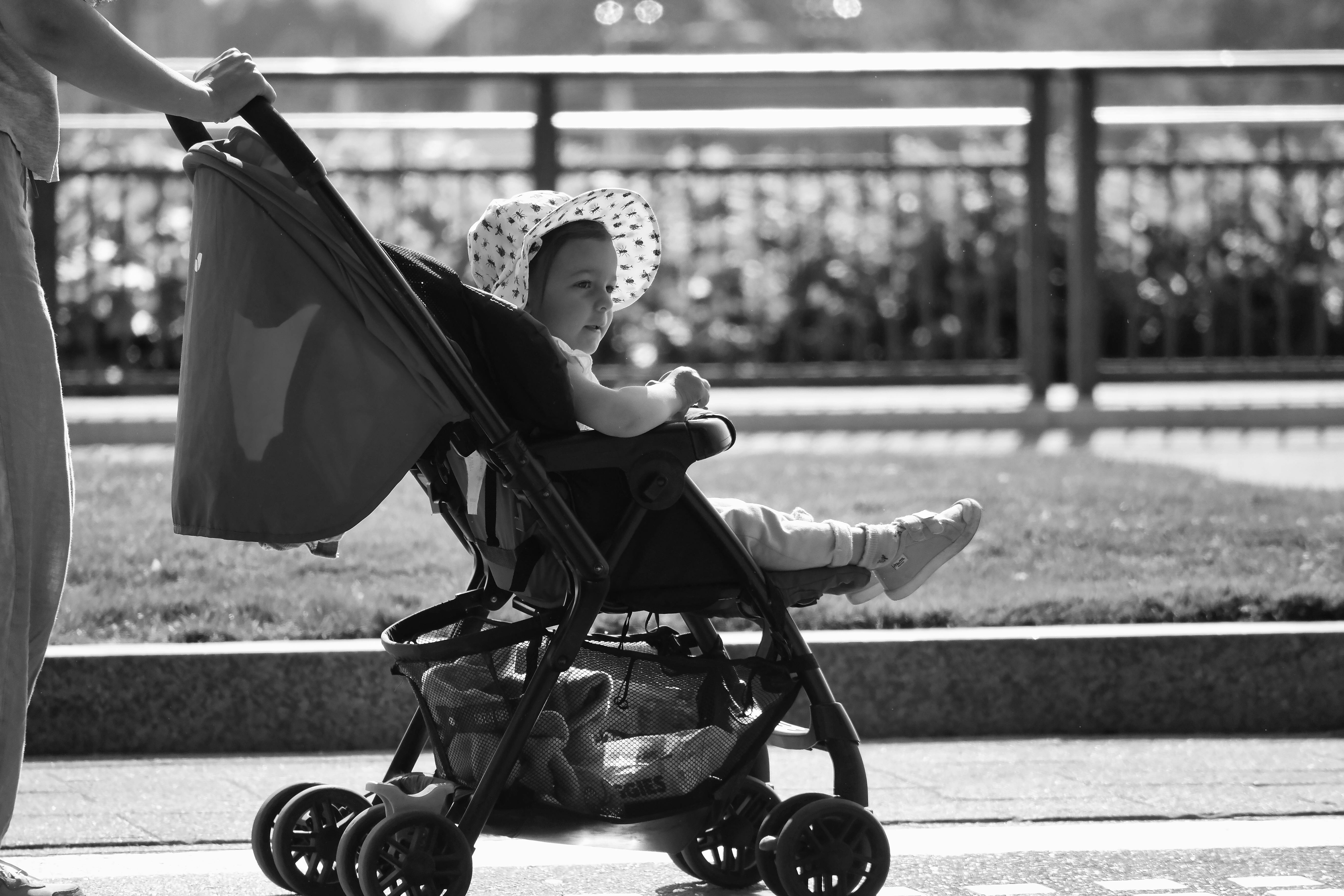 Compact stroller being used outdoors