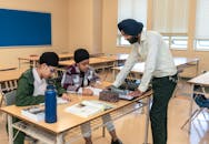 Teacher with Two Students