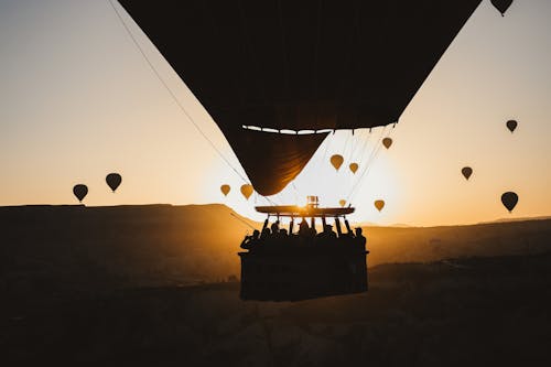 Darmowe zdjęcie z galerii z balony na gorące powietrze, latanie, ludzie