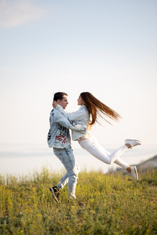 Couple Hugging on Meadow