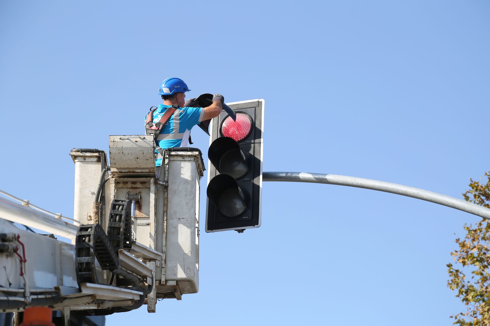 electrician adjusting smart lighting system