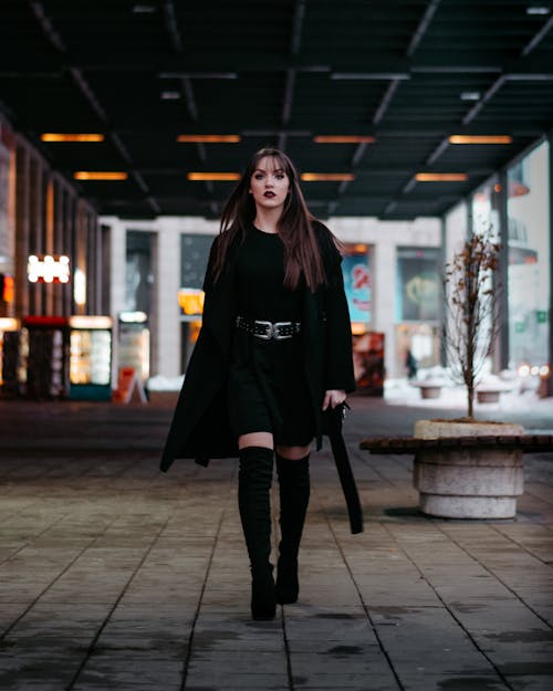 Shallow Focus Photo of Woman in Black Jacket Walking