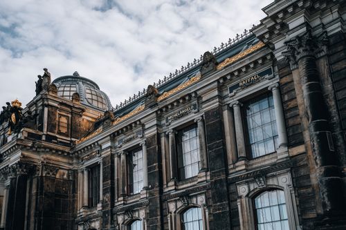 Free Stunning architectural details of a historic building showcasing classic artistry with clear skylight view. Stock Photo