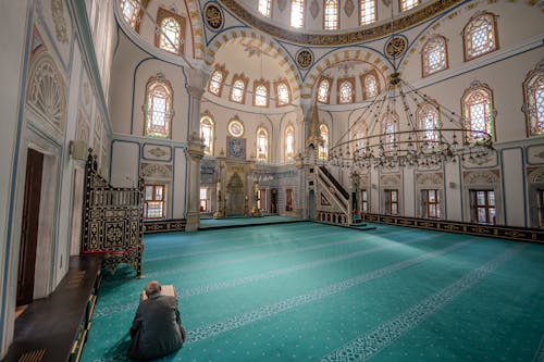 Elderly Man Sitting in Beylerbeyi Mosque