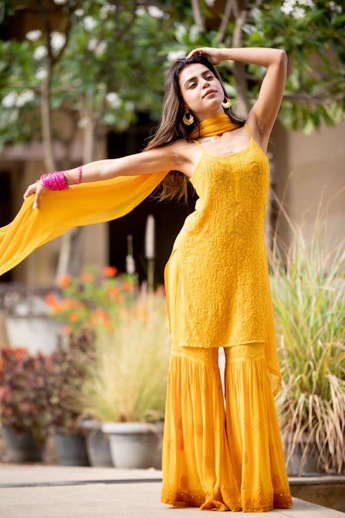 Model Standing in Traditional Dress