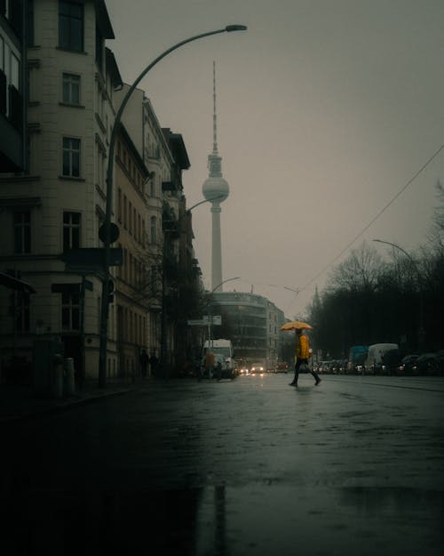 Street in Berlin with the View of the Berliner Fernsehturm during Rain 