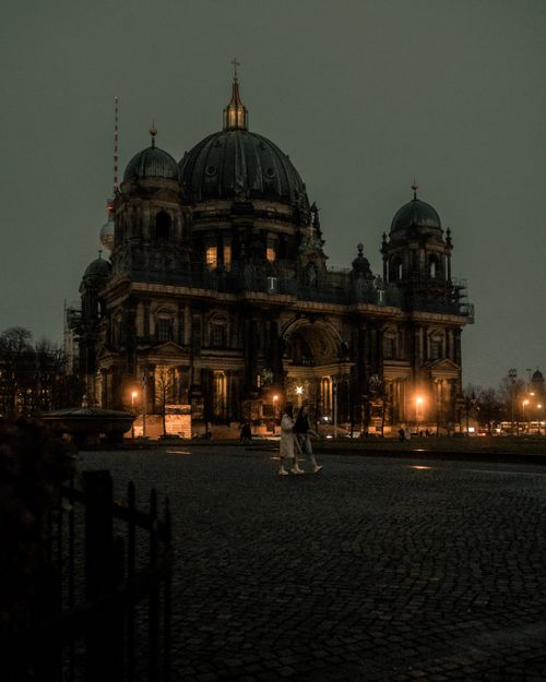 Free Dramatic view of Berlin Cathedral glowing in evening light, showcasing iconic architecture. Stock Photo