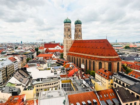 Stunning aerial view of Munich showcasing the iconic Frauenkirche with cityscape in the background.
