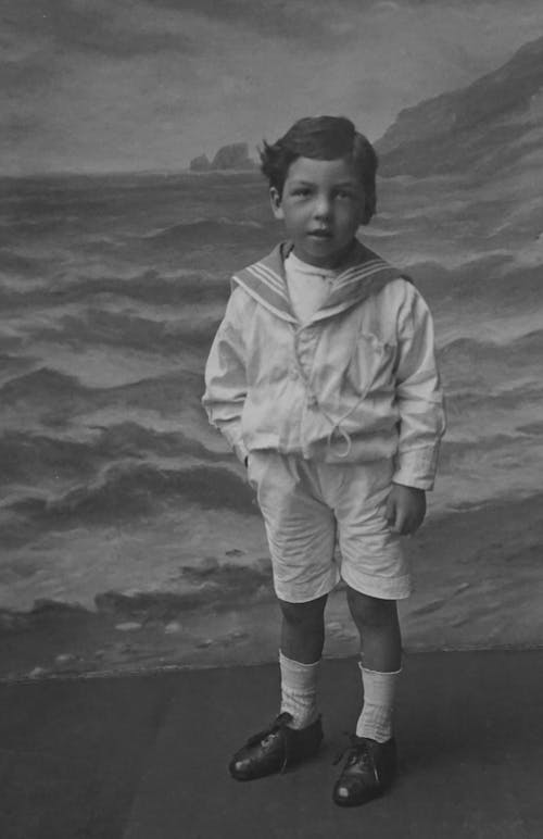 Boy with Sea Shore Background in Black and White