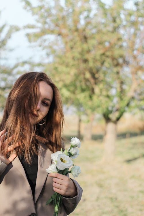 Portrait of Woman with Flowers