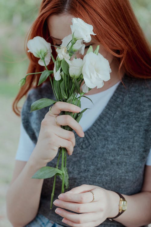Redhead Woman with Flowers