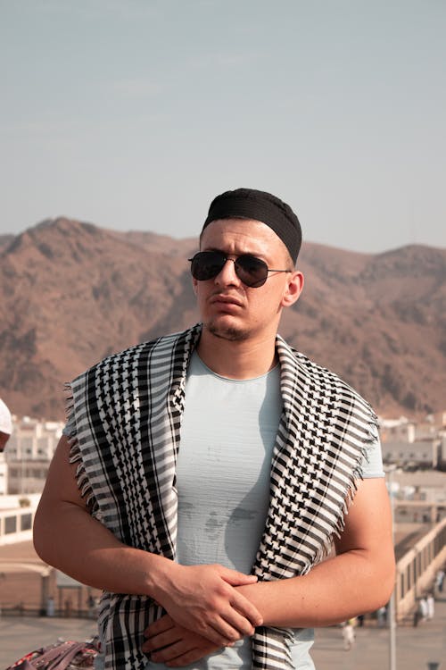 Man in Scarf and Sunglasses