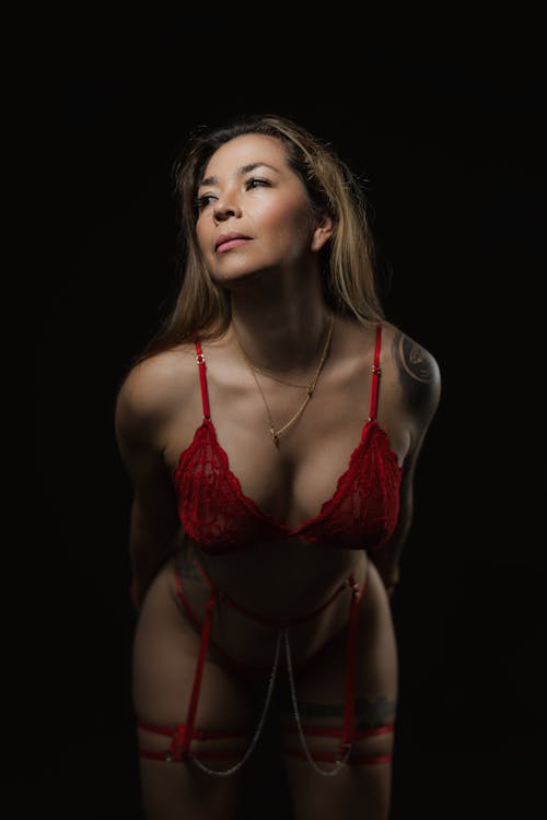 Woman Posing in Red Lace Lingerie 