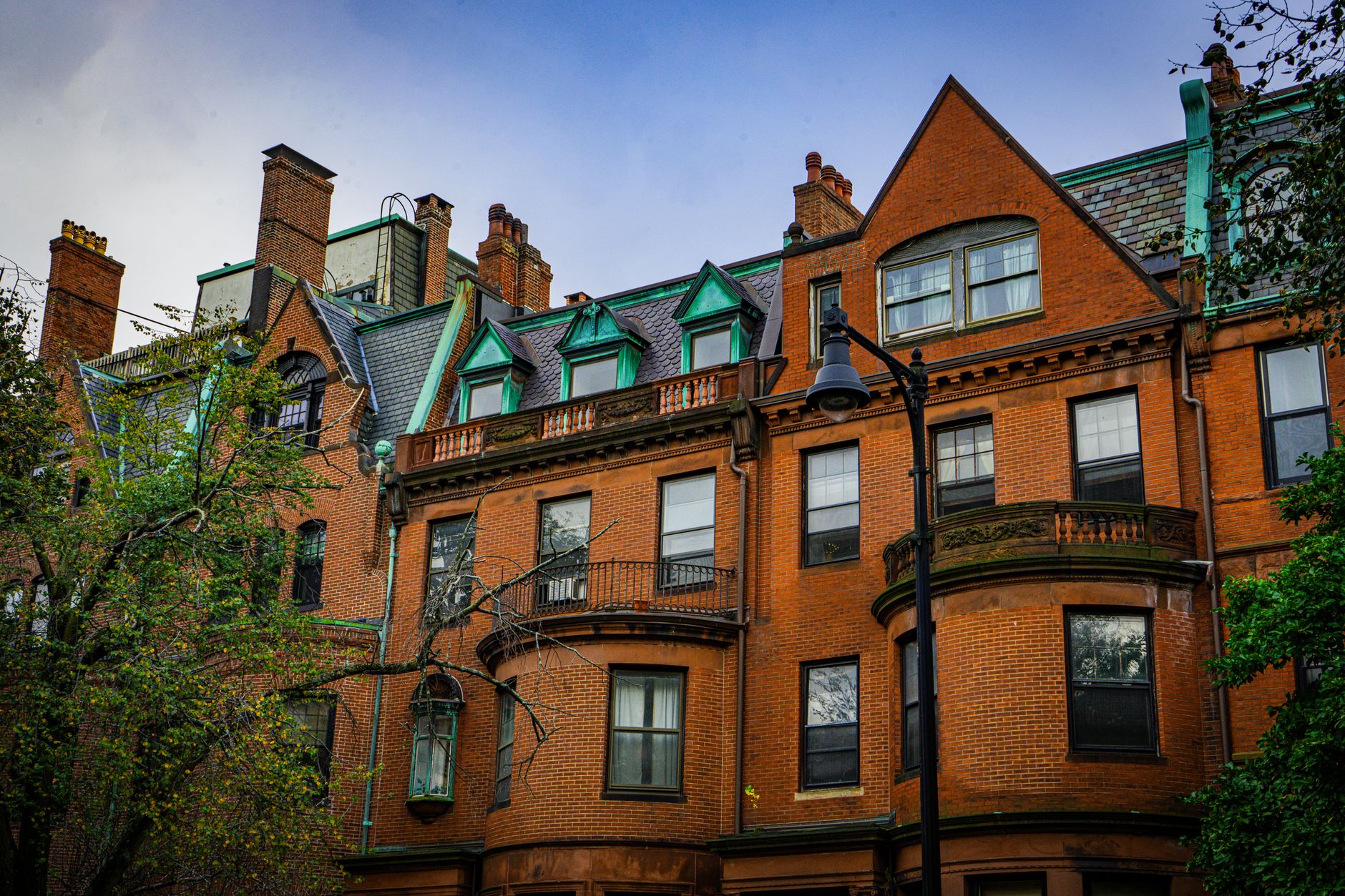 A detailed view of historic brick buildings with classic architectural elements in Boston, Massachusetts.