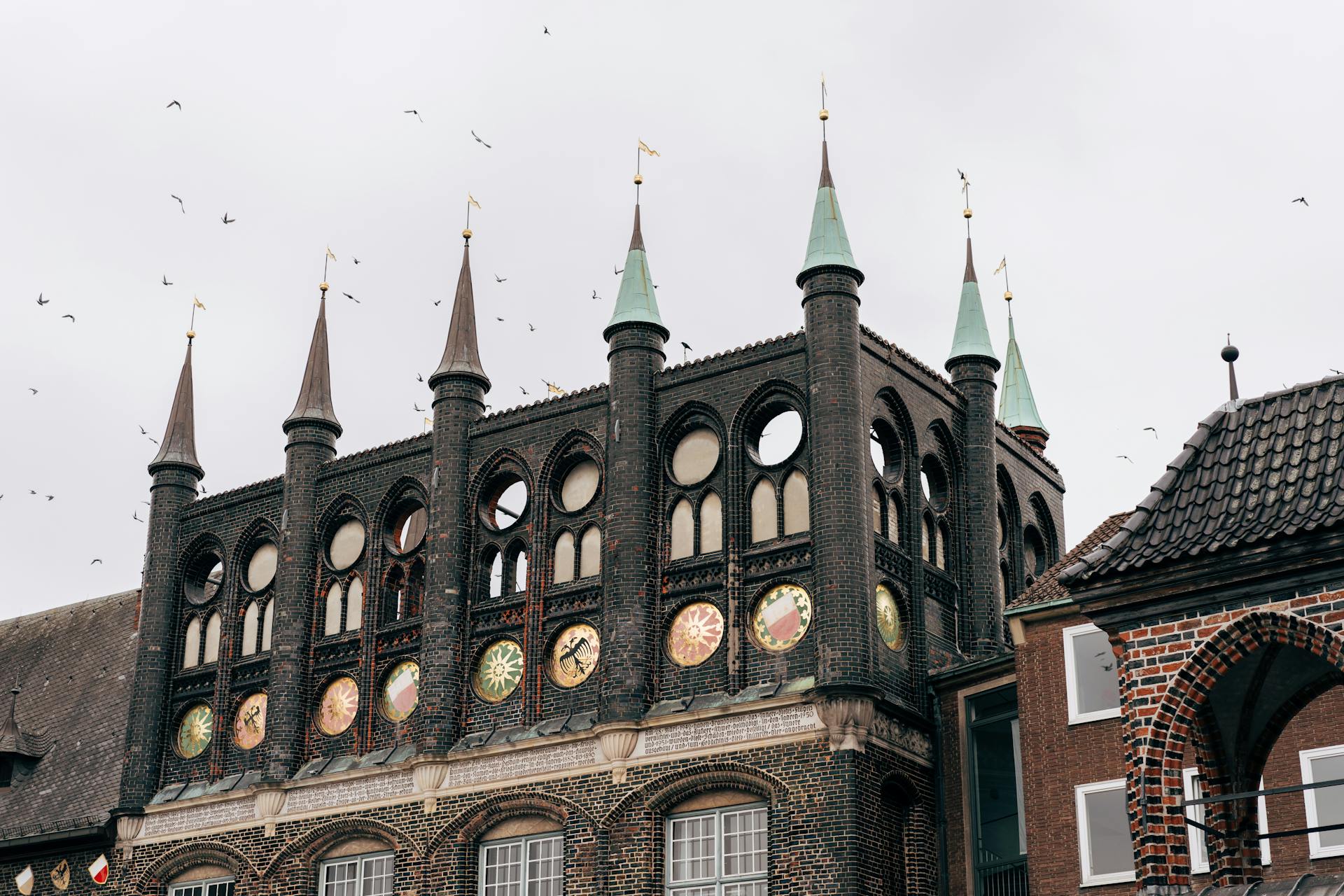 Stunning view of the iconic Lübeck Town Hall facade, showcasing gothic architecture.