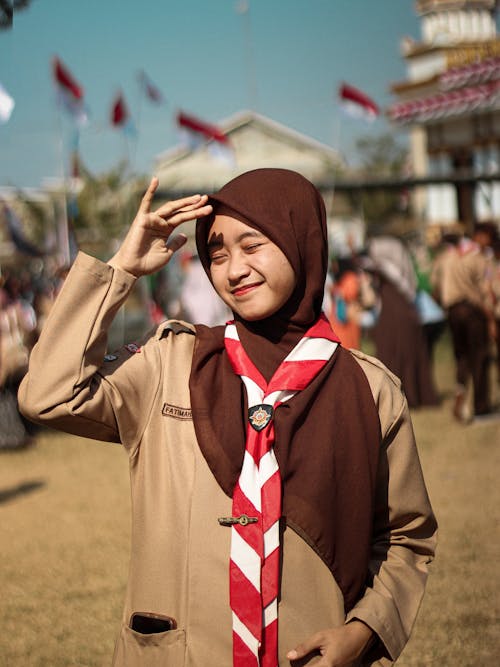 Sunlit Woman in Hijab and Tie