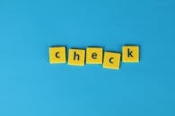 Yellow Letter Tiles on Blue Background