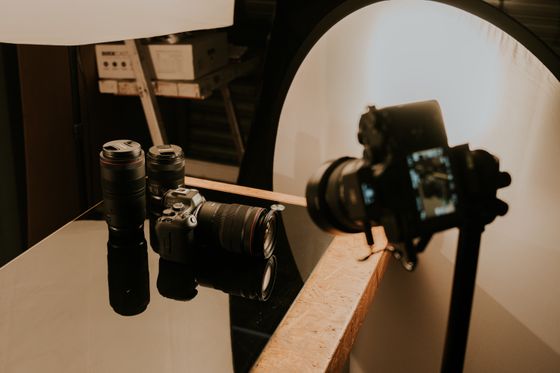 Camera on a tripod in a small studio, photo by Amar Preciado on Pexels