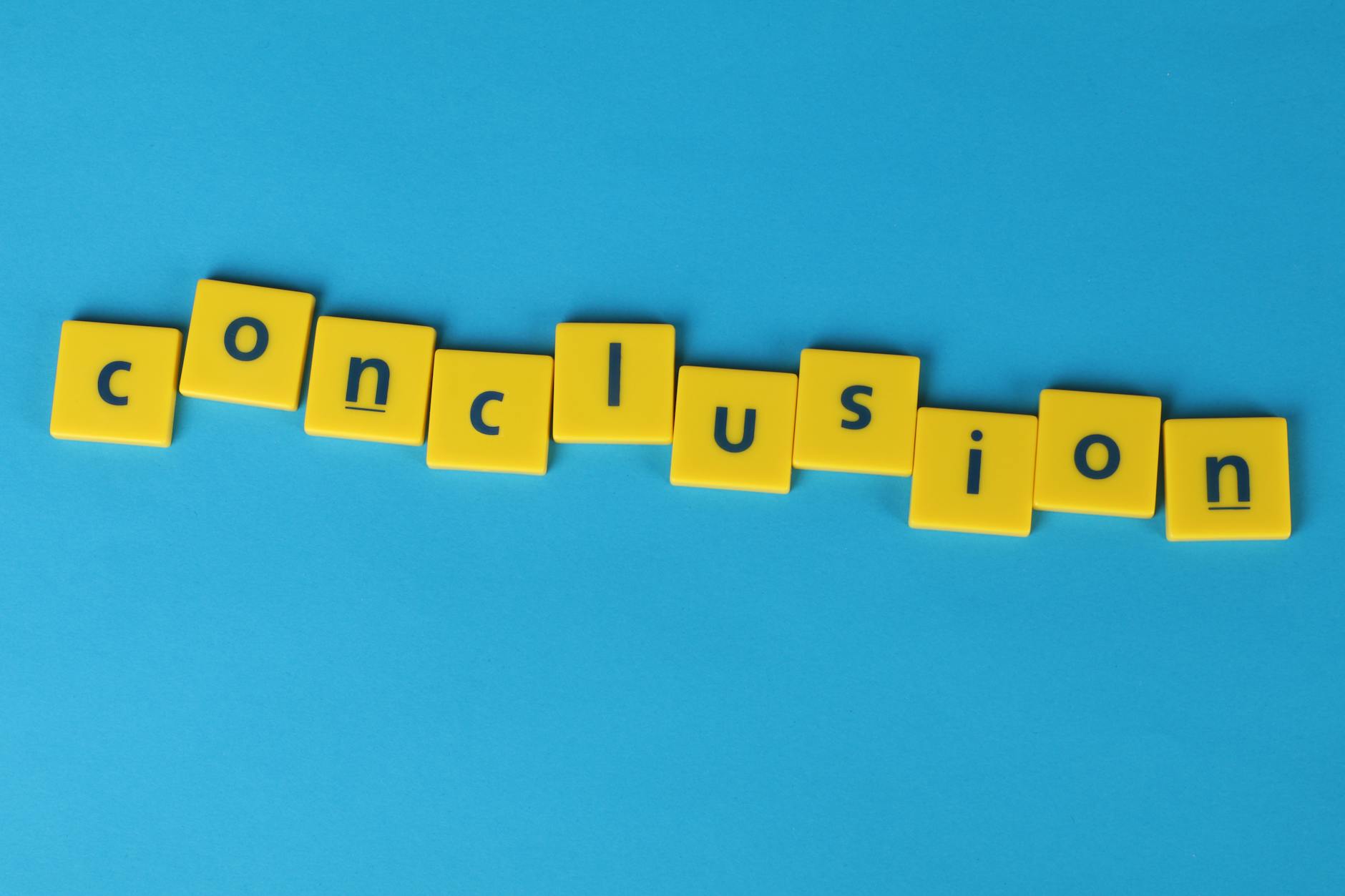 \"Conclusion\" Word Formed From Lettered Yellow Tiles