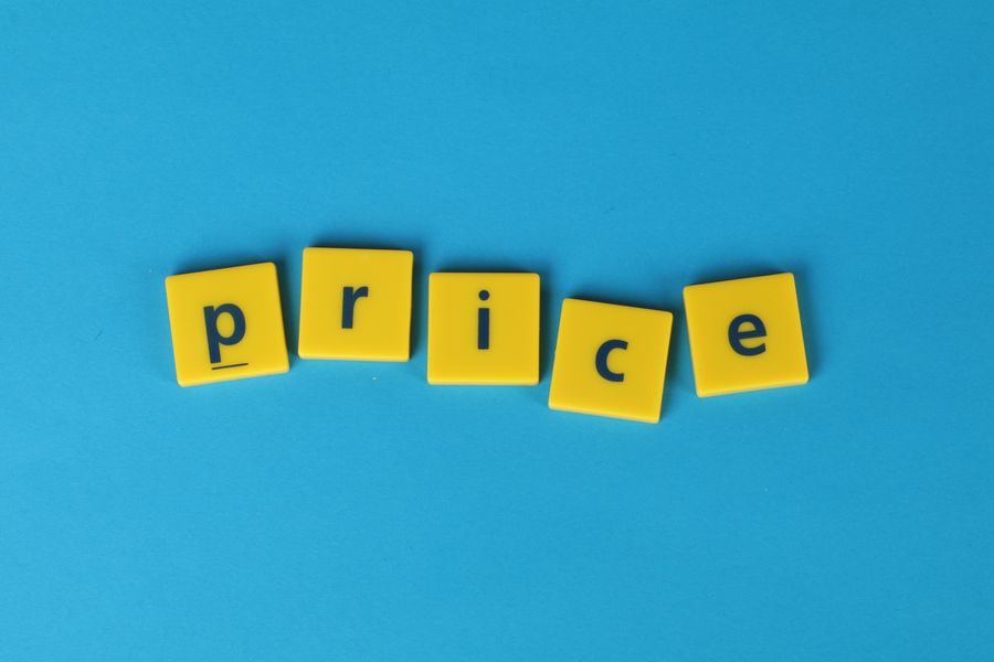 Pricing tiles spelling out cost