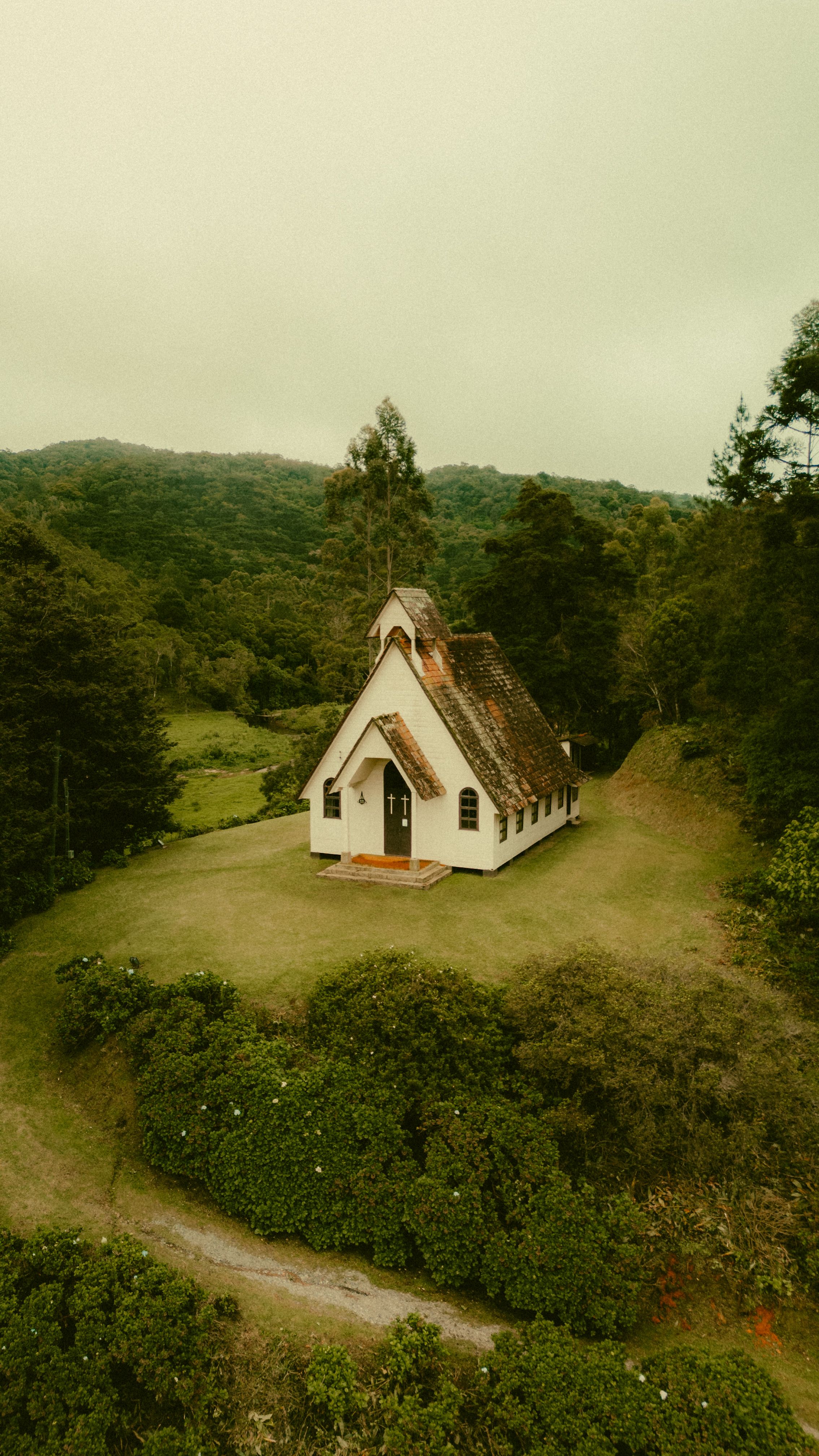 Aerial View of a Chapel in the Forest · Free Stock Photo