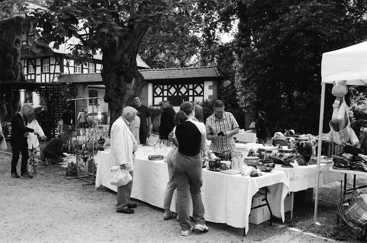 People On A Street Market In A Town 