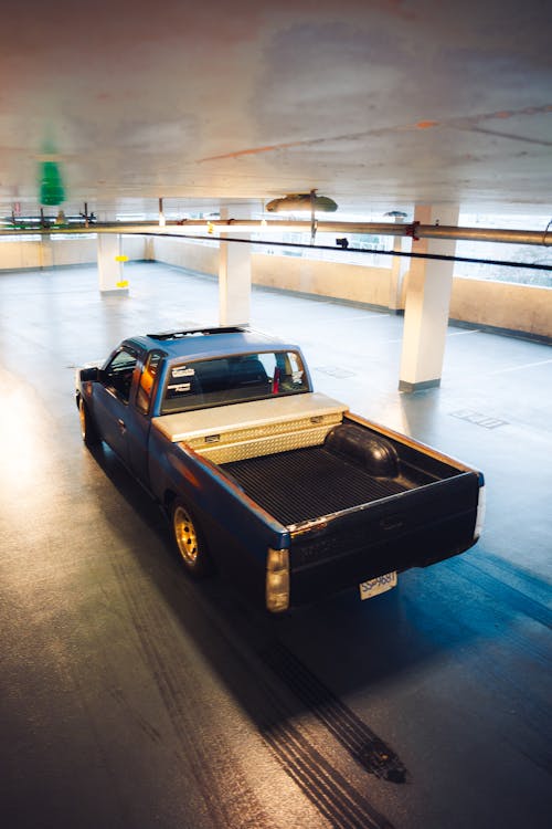 A Nissan Truck in a Garage 