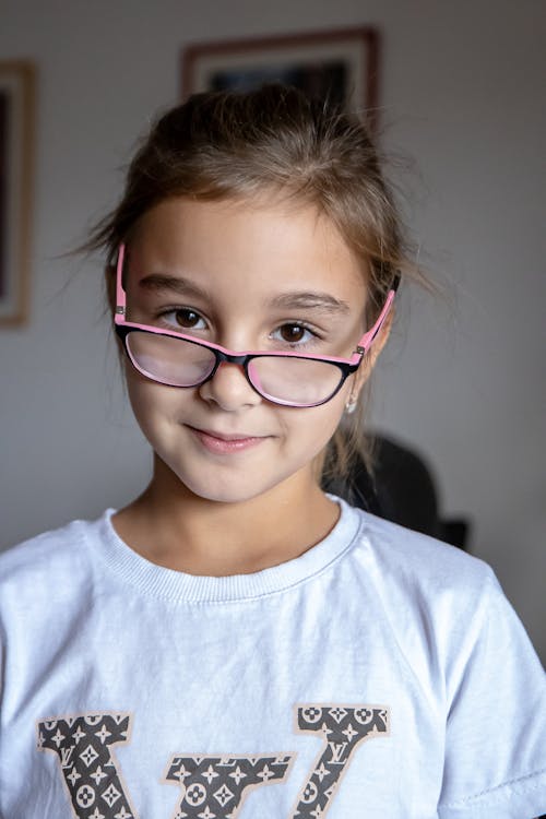 Portrait of a Cute Girl with Eyeglasses