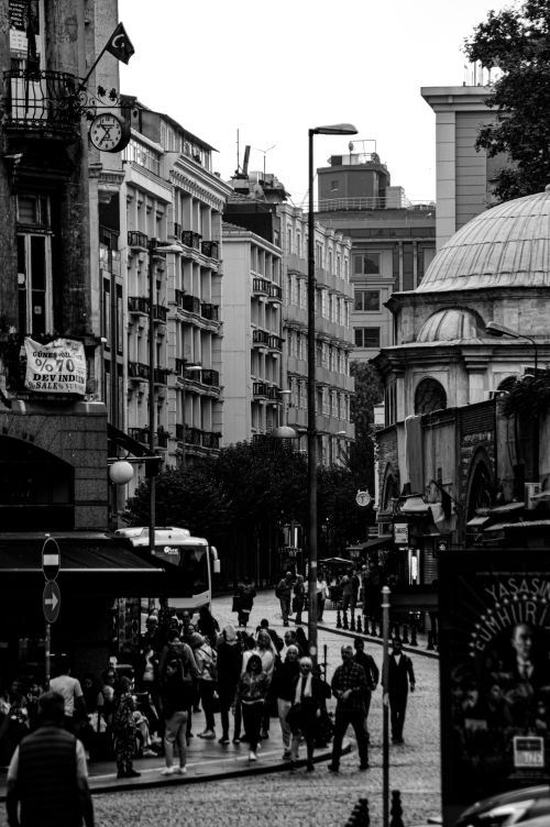 Free Black and white photo of a crowded Istanbul street with historic architecture. Stock Photo