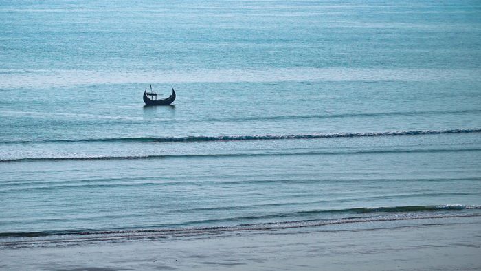 A lone fishing boat off the Kutubdia coastline