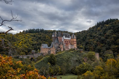 Medieval Eltz Castle on a Hill in Autumn Forest, Wierschem, Germany