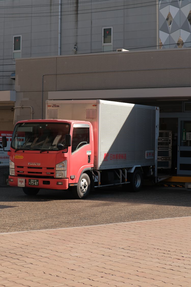 Truck In Front Of A Warehouse 