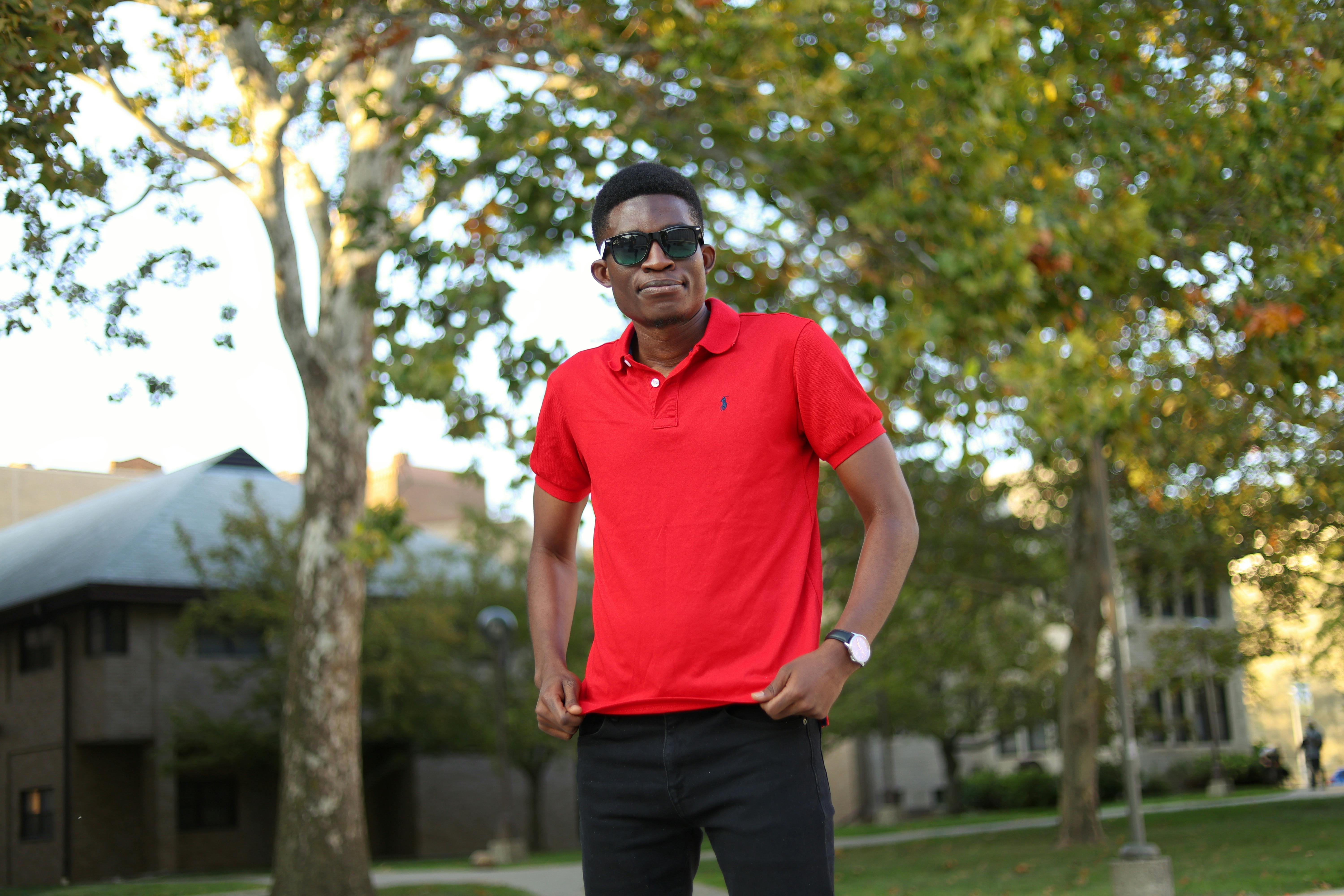 Red polo and black pants on sale