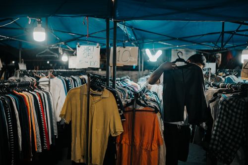 Free Explore a vibrant night market in Iligan City, Philippines, showcasing clothes and lively ambiance. Stock Photo