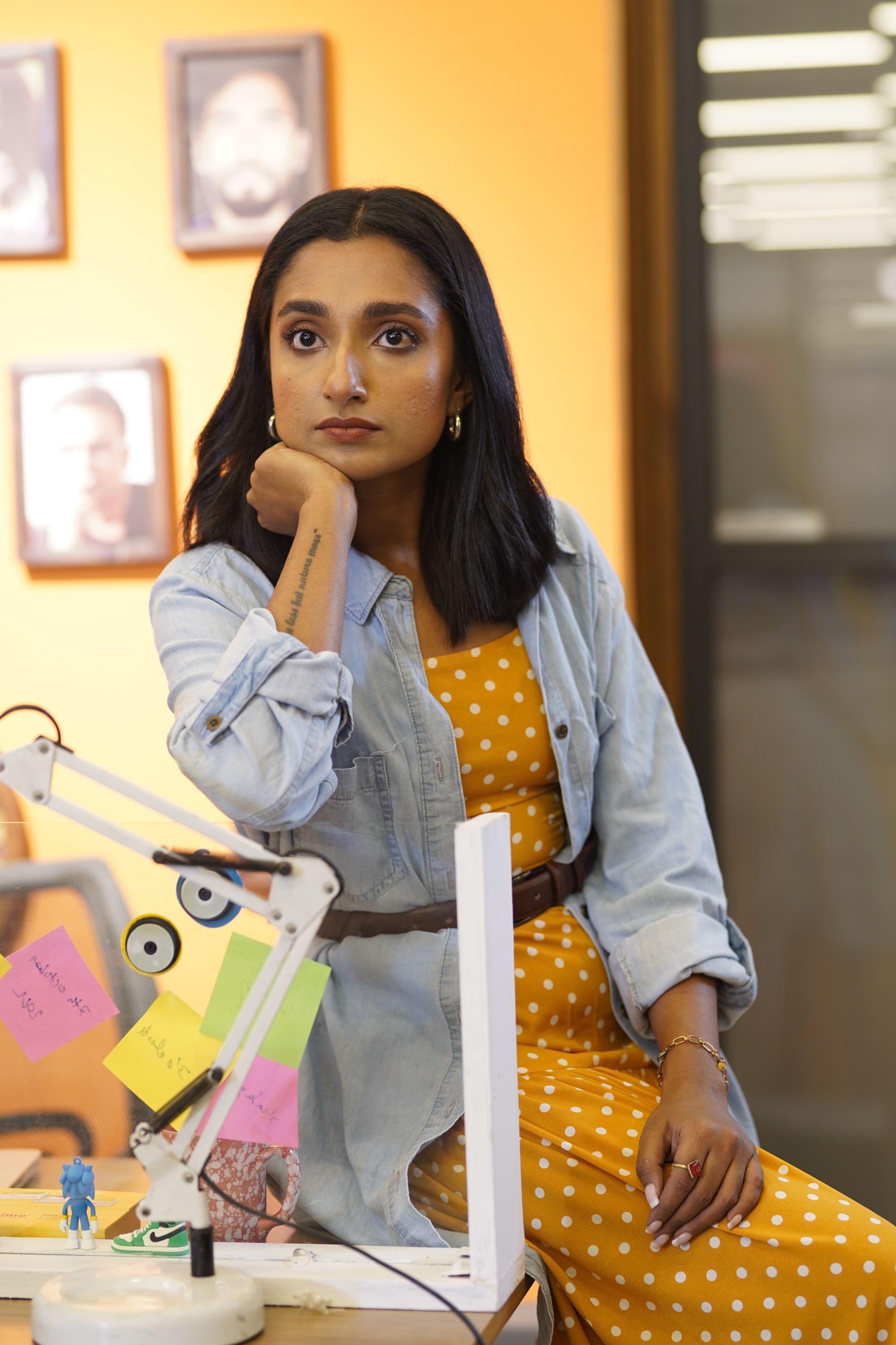 A woman working at an office desk