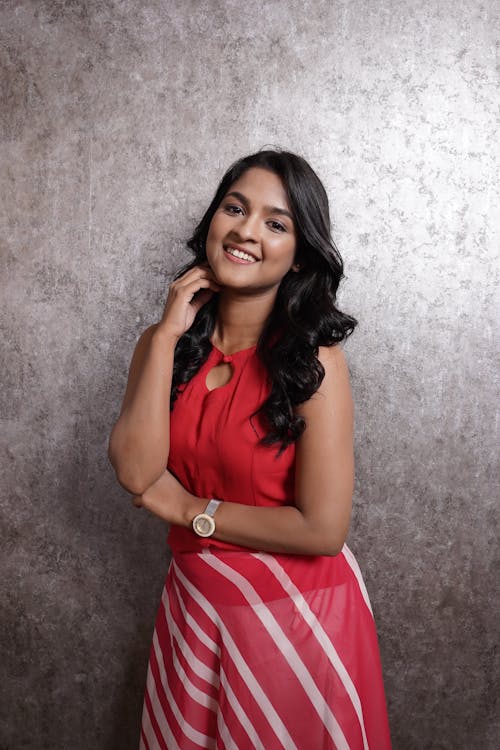 Portrait of a Female Model Wearing a Red Dress