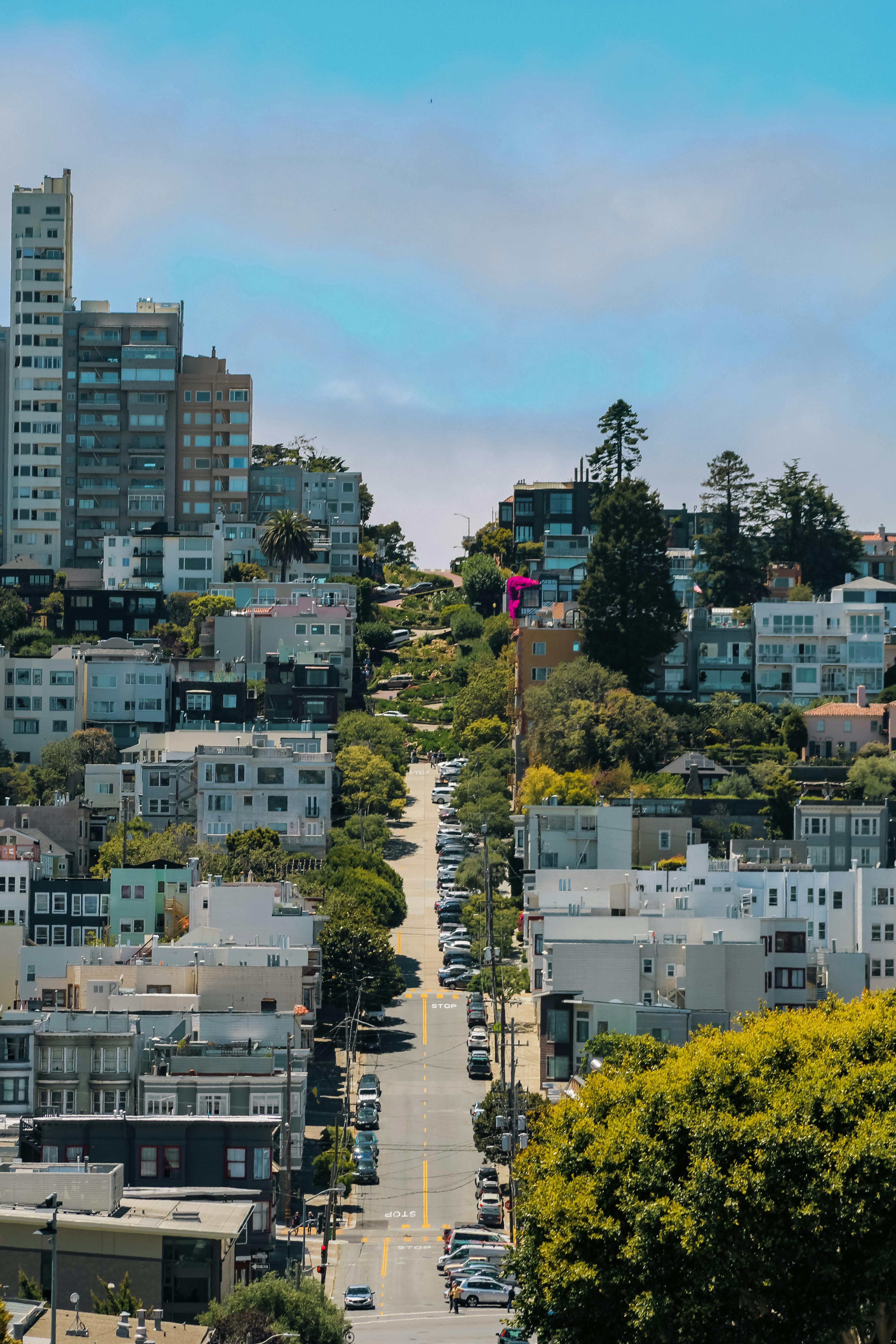 A Zigzag Street Between Concrete Houses · Free Stock Photo