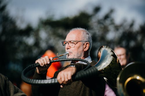 Man Playing on Hunt Cornet