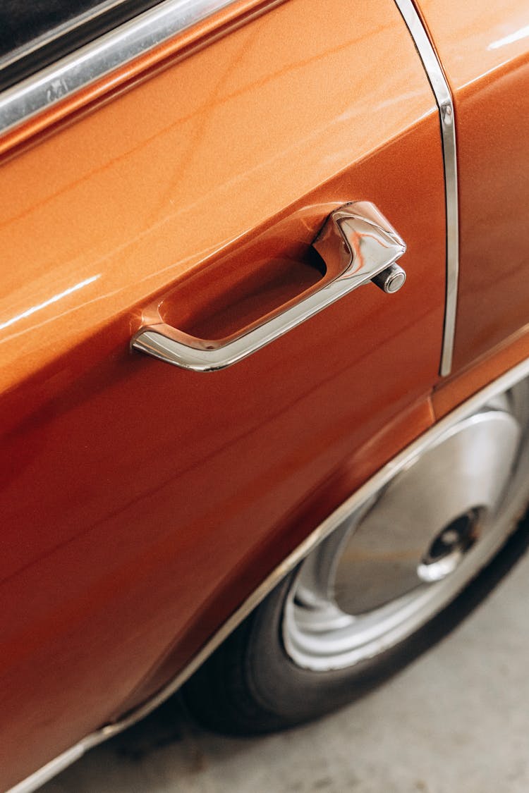 Door Of A Vintage Orange Car 