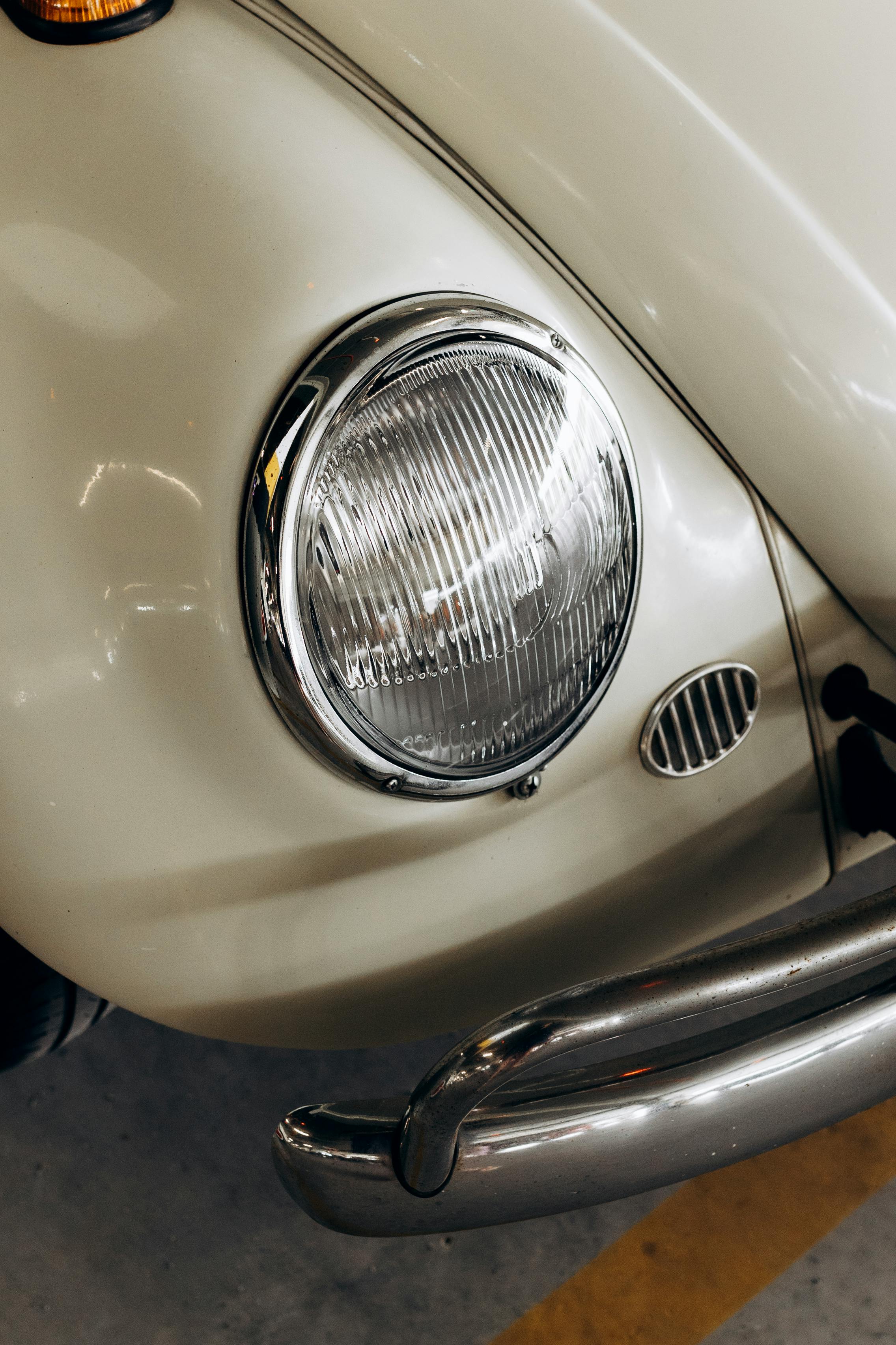 Close-Up Photo of a White Volkswagen Beetle Car Headlight · Free Stock ...