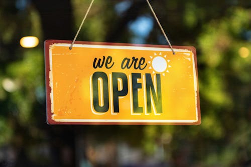 Orange Open Sign on Window