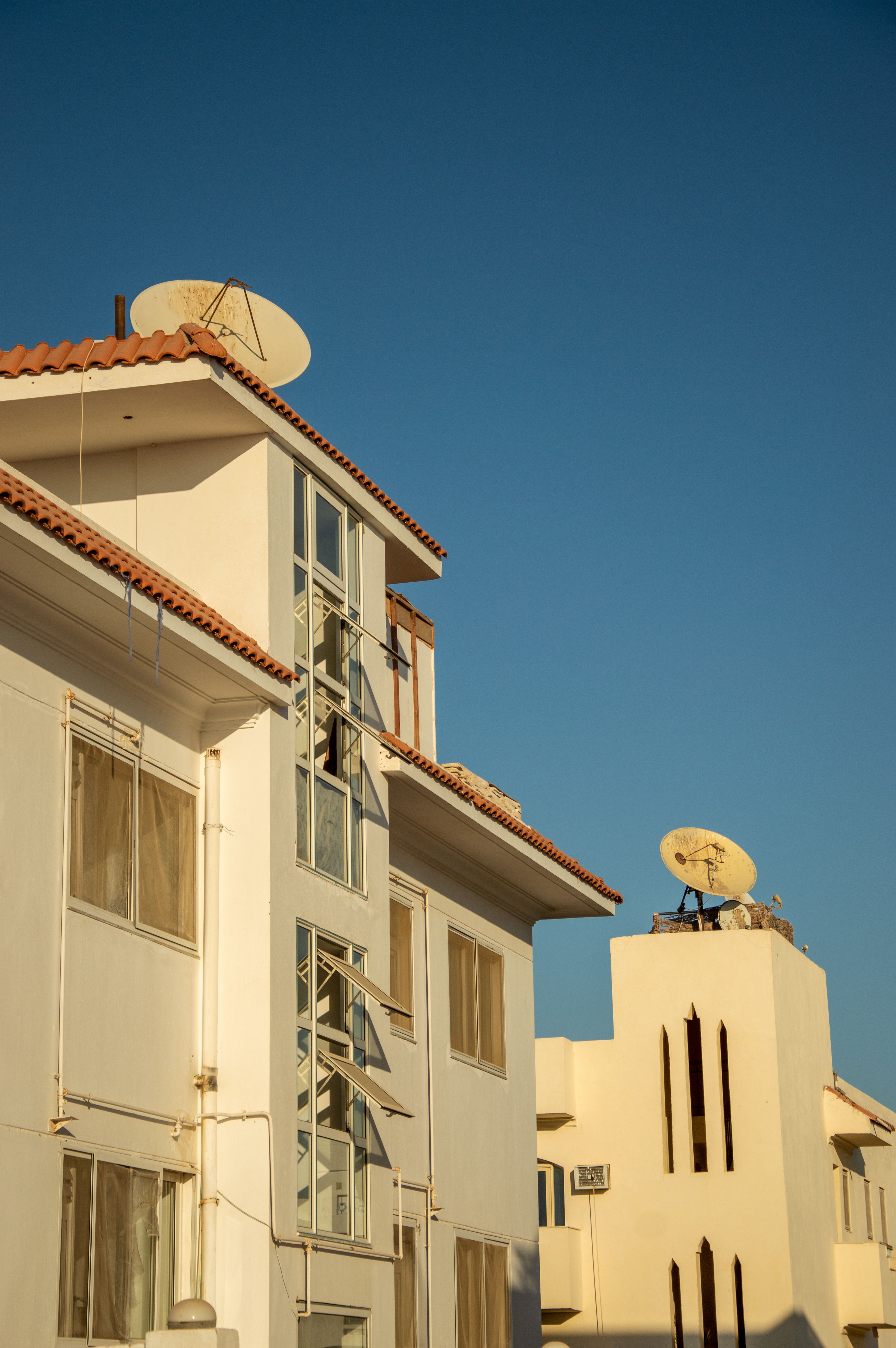 A Starlink satellite dish installed on a rural rooftop to improve Starlink internet speeds.