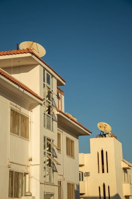 A Starlink satellite dish installed on a rural rooftop to improve Starlink internet speeds.