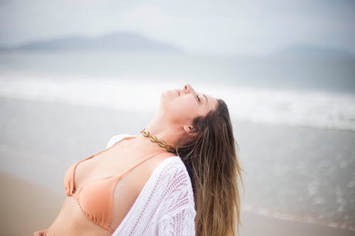 Woman Standing Near Ocean