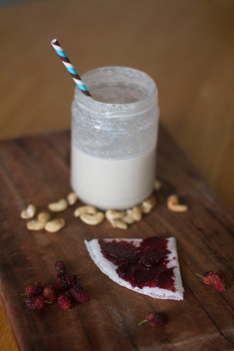 Milk, Nuts And Berries On The Table