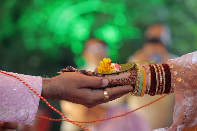 Bride Receiving Gift At Indian Wedding