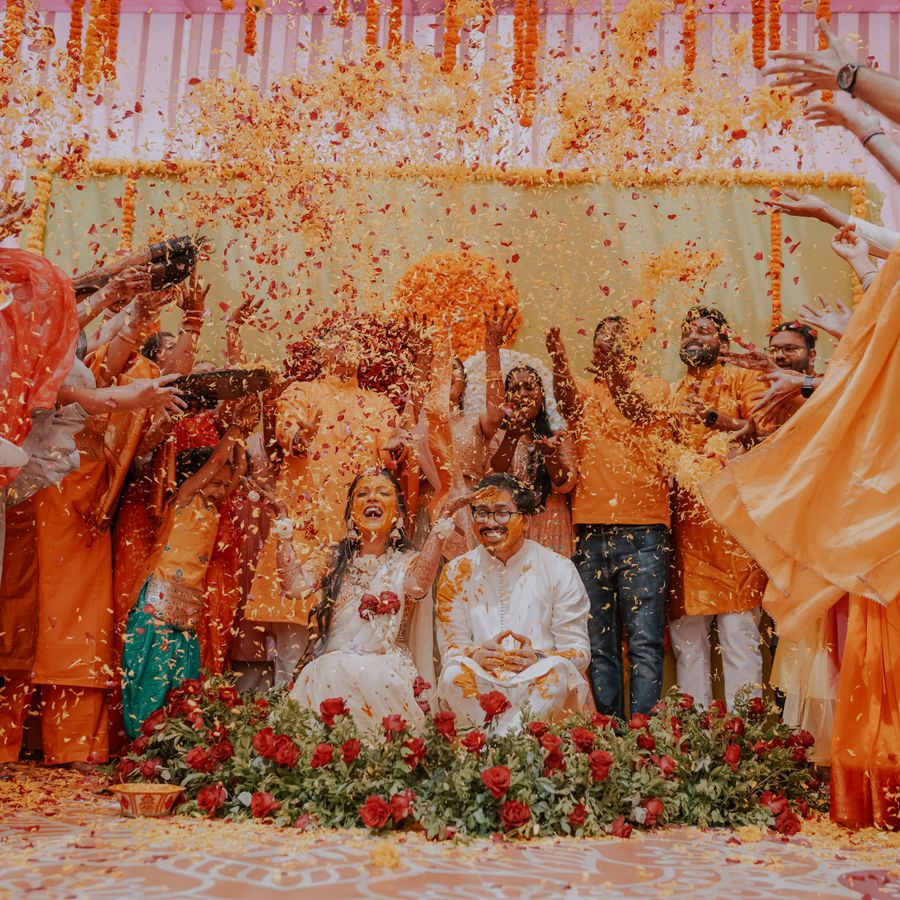 Guests at a colorful Indian wedding celebration
